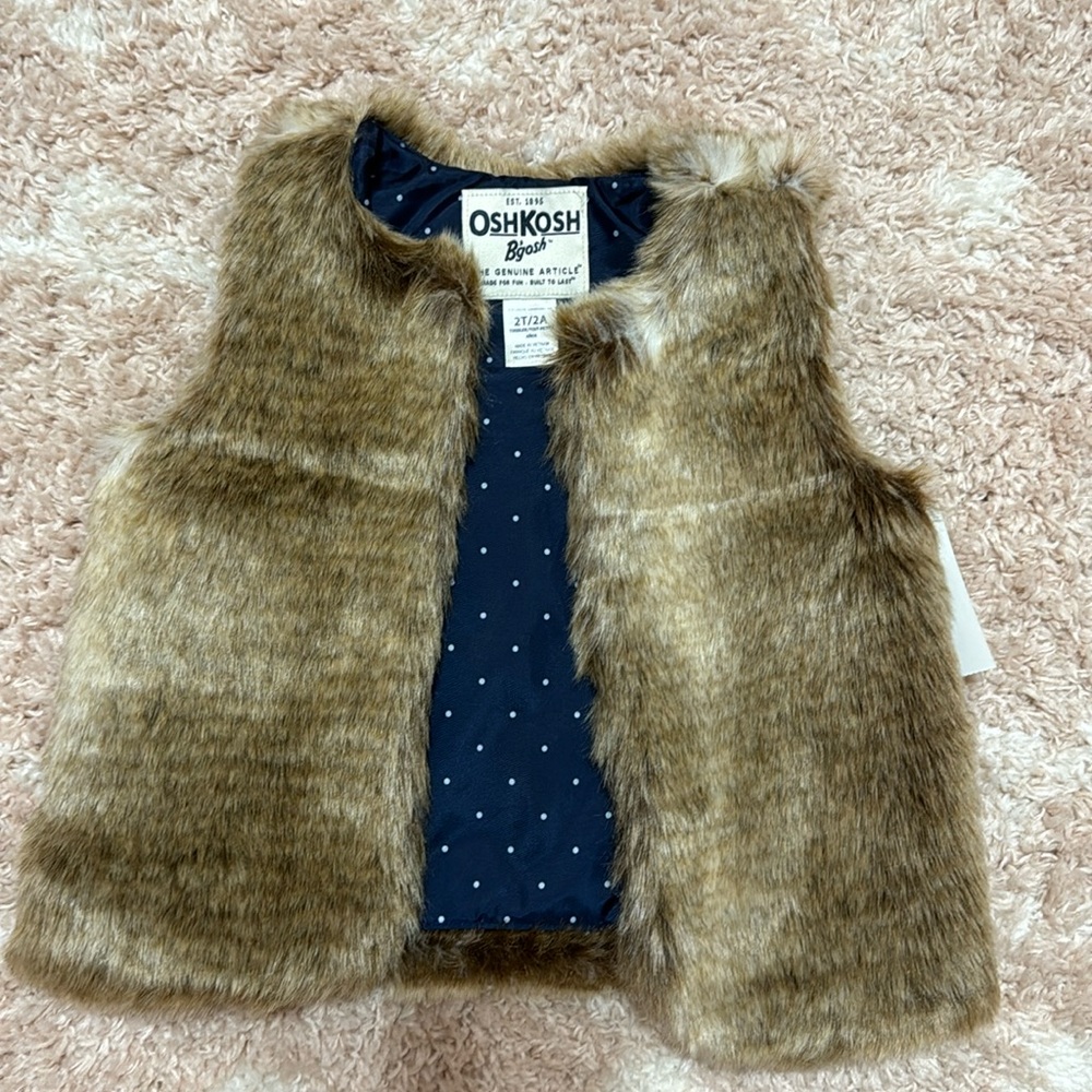 OshKosh B’gosh 2T/ 2A Toddler faux fux sleeveless sweater. Never worn.